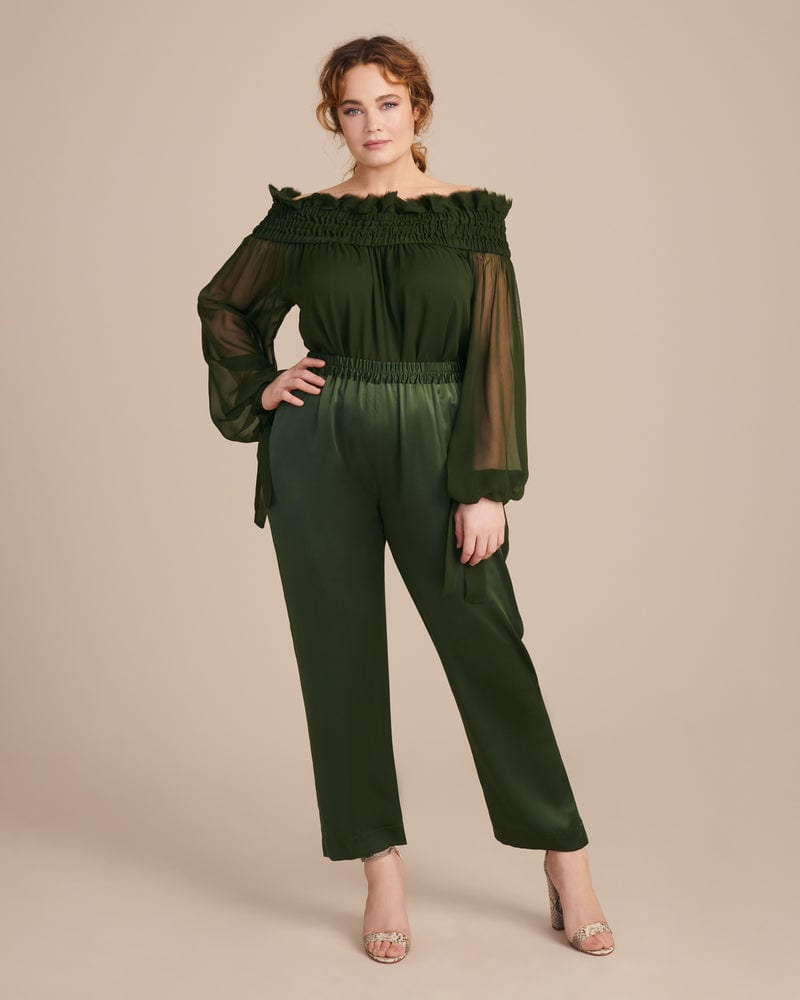 Front of a model wearing a size 14 Satin Icon Track Pant in Olive by Juan Carlos Obando. | dia_product_style_image_id:226375